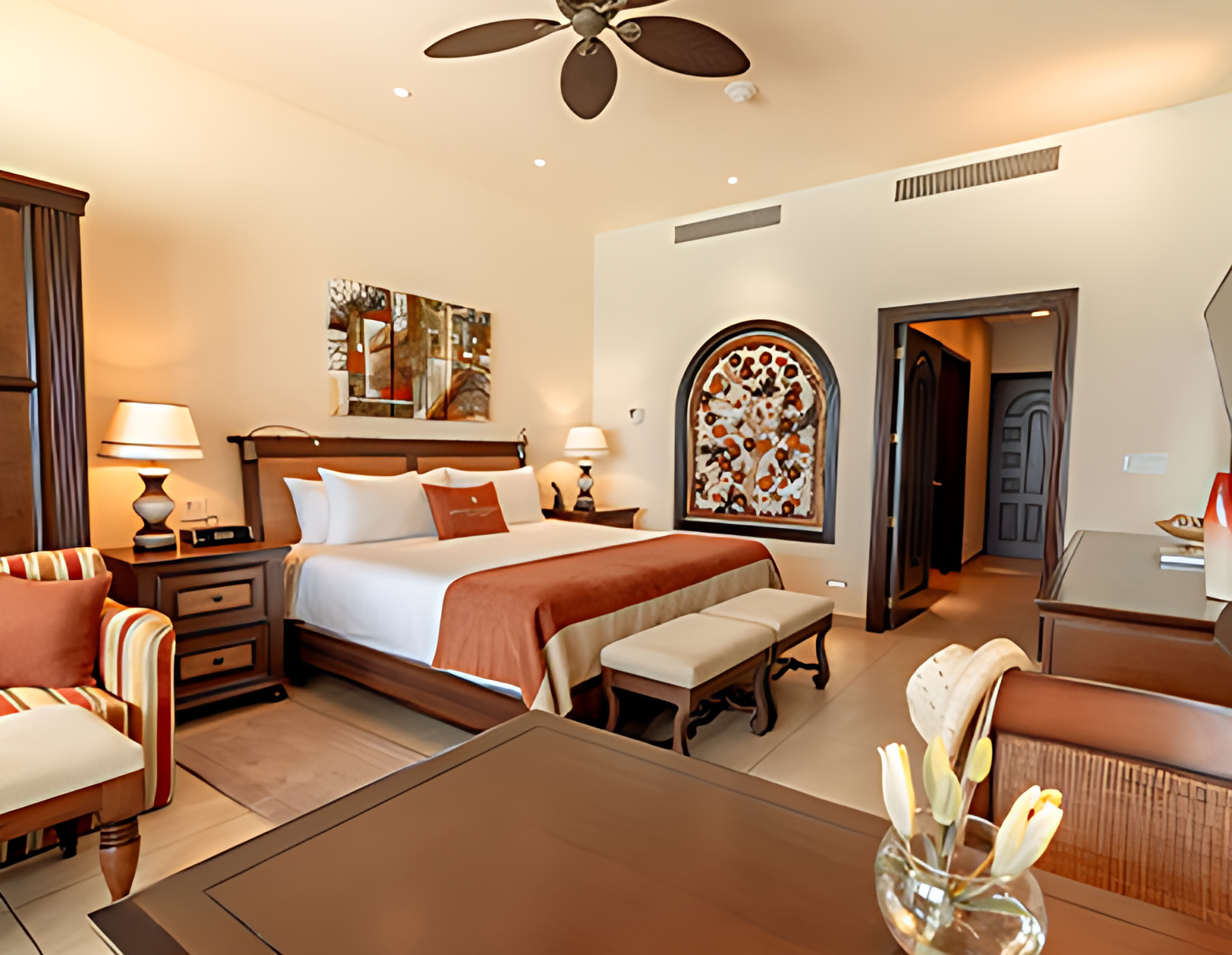 Grand Residences master suite with king bed and living area