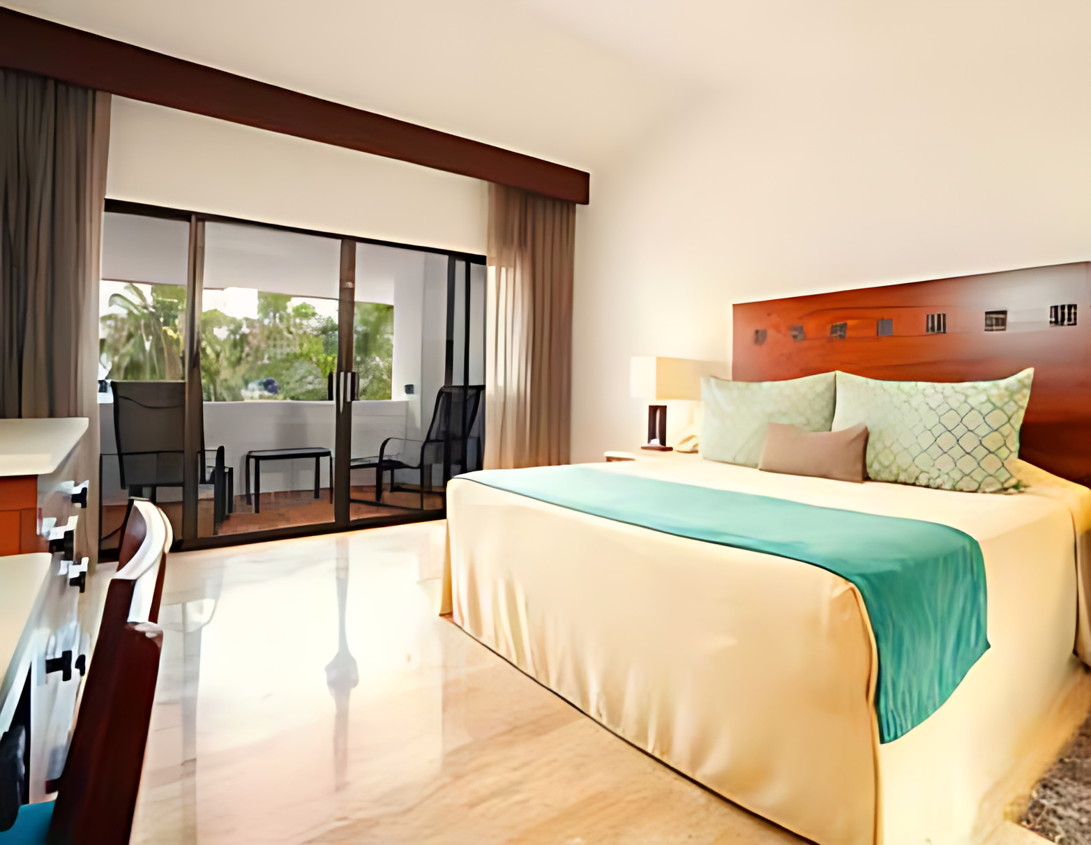 The Royal Cancun suite king bedroom and terrace